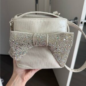 Betsey Johnson Cream Crossbody Bag with Rhinestone Bow